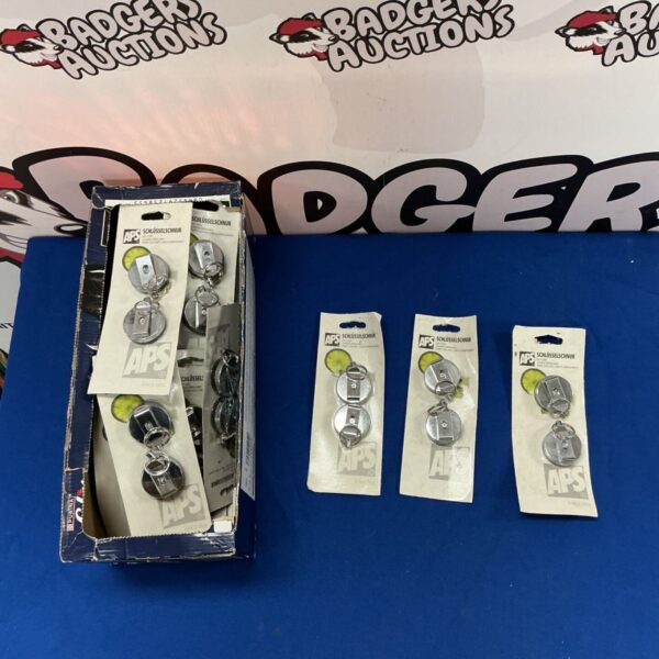 APS key cords lot, retractable security keychains in a box.
