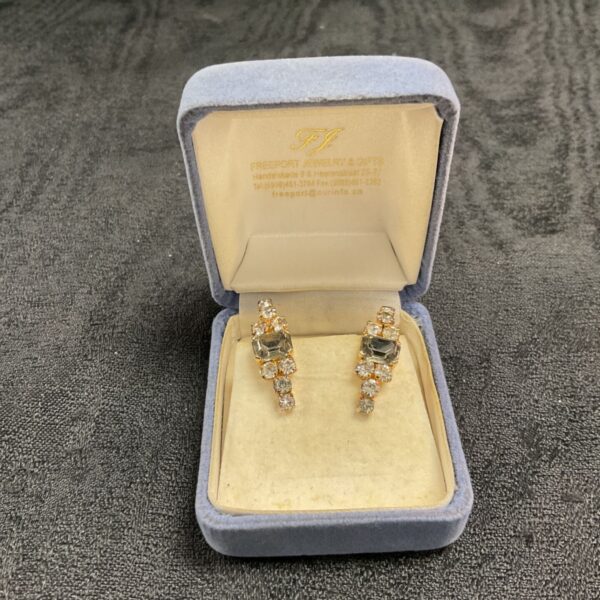 Vintage Art Deco emerald earrings in original Freeport Jewellers box.