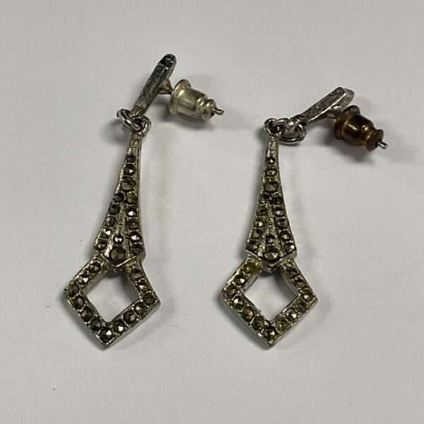 Vintage Art Deco marcasite drop earrings with silver tone finish.