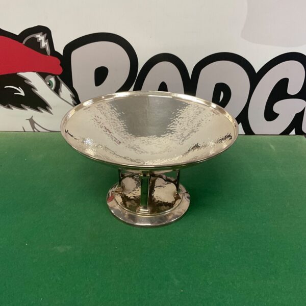 Vintage Art Deco silver plated pedestal bowl for display.