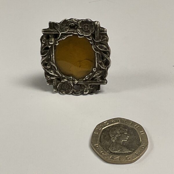 Vintage Art Nouveau whitemetal picture frame with floral details.