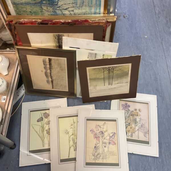 Assorted framed pictures and prints in a mixed lot for wall decor.