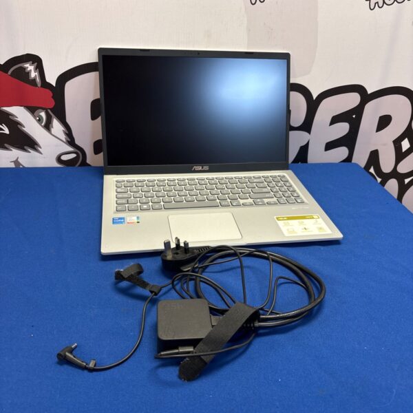 ASUS Vivobook X1500E laptop with charger, used condition.