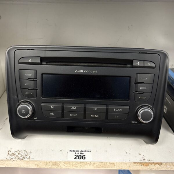 Audi Connect car radio unit with control buttons.