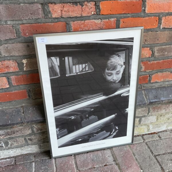 Framed black and white Audrey Hepburn photograph by Dennis Stock.