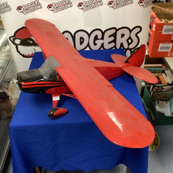 Red balsa model Cessna airplane for collectors and hobbyists.