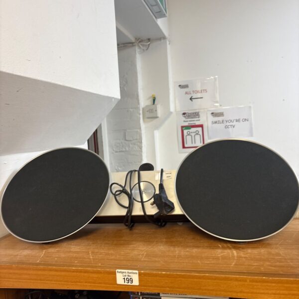 Bang & Olufsen BeoSound 8 speakers, vintage audio system on display.