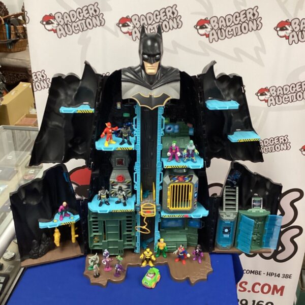 Front view of the vintage Batman Batcave playset with figures.