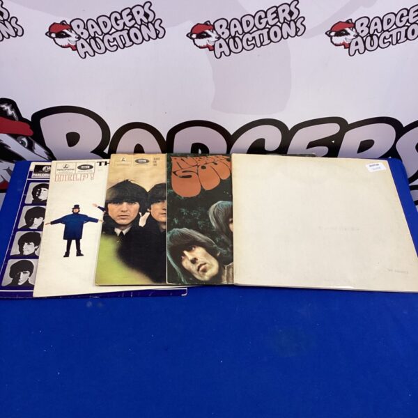 Beatles vinyl record album cover, collectible music.