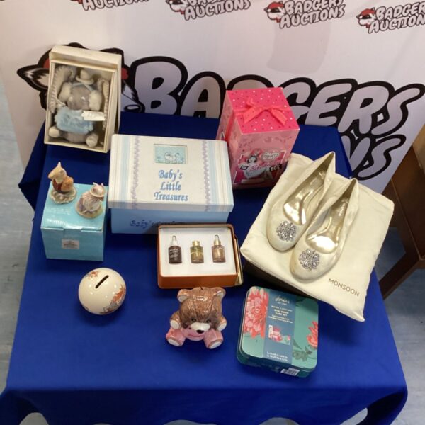 Mixed lot of Beatrix Potter figures and vintage moneyboxes for collectors.