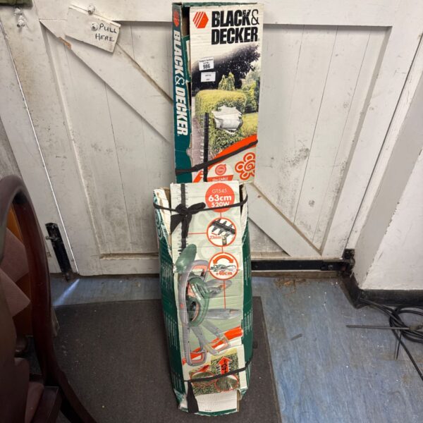 Used Black & Decker GT545 electric hedge cutter for garden maintenance.