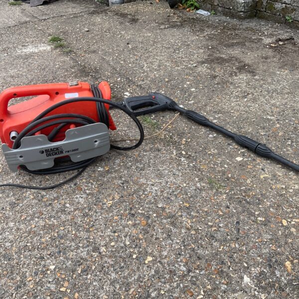 Black & Decker PW1300C compact pressure washer for garden cleaning.
