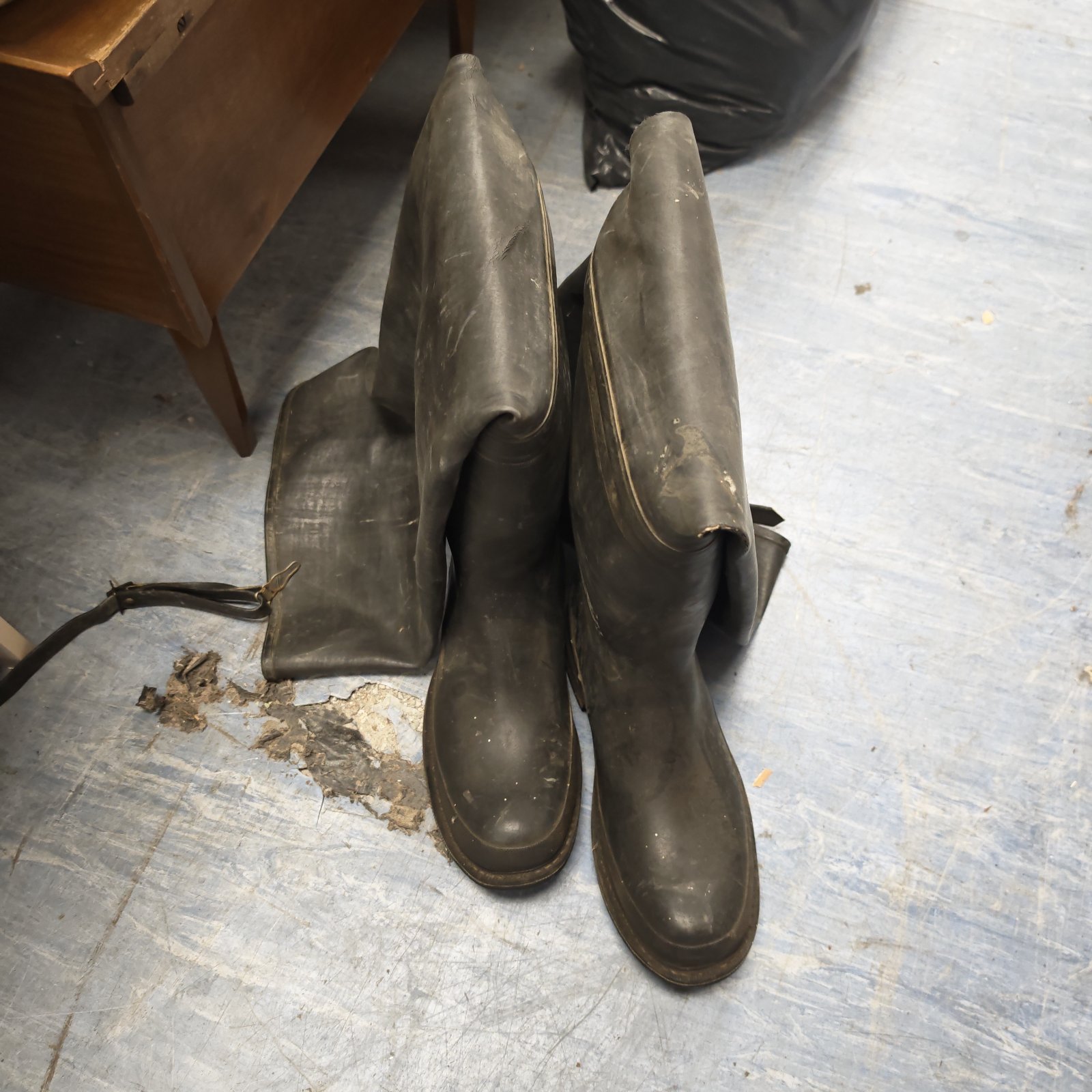 Black leather waders size 9 for fishing and hunting.