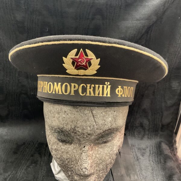 Vintage Black Sea Fleet sailor hat with emblem and Cyrillic text.