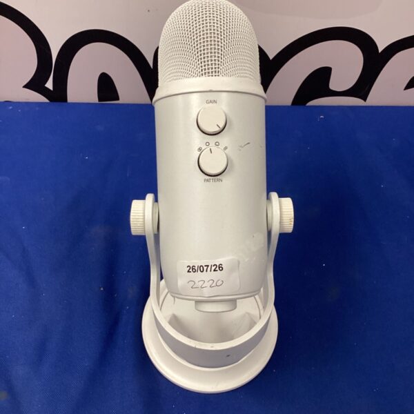 Blue condenser microphone with gain control dial for audio recording.