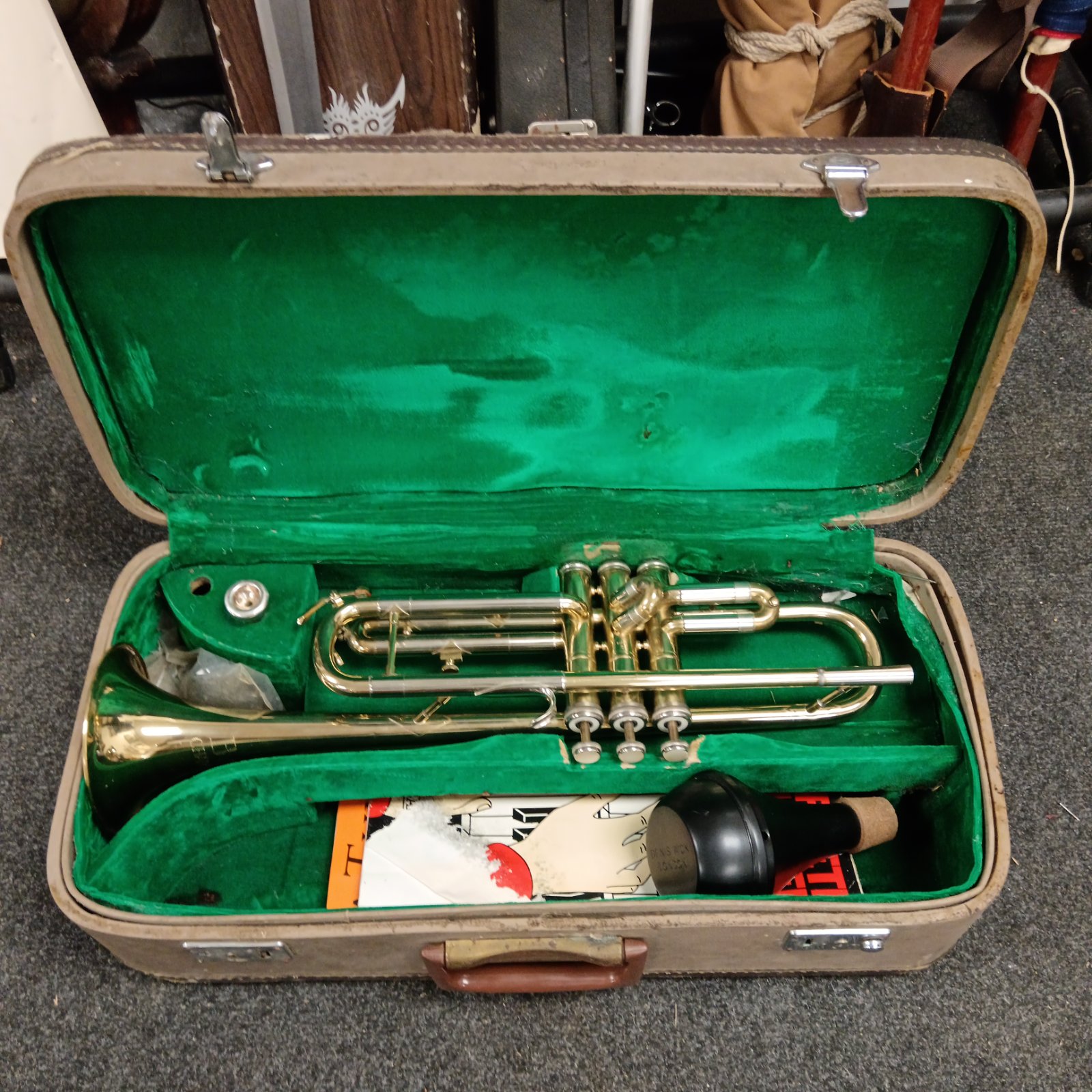Vintage B&M Champion trumpet in its original case.