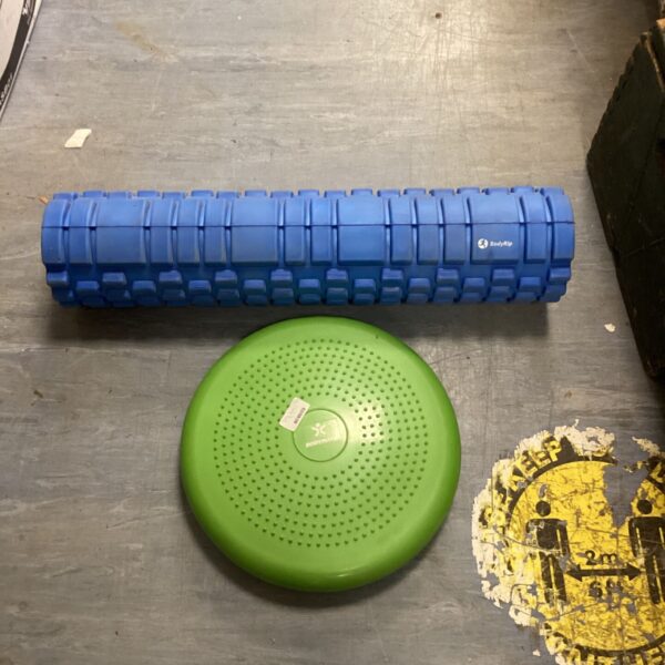 Bodyrip blue foam roller and green balance disc fitness equipment.