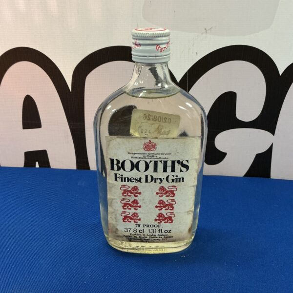 Vintage Booth’s Dry Gin bottle with royal warrant label.