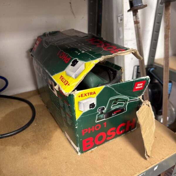 Vintage Bosch PHO 1 sander in original box, showing wear.