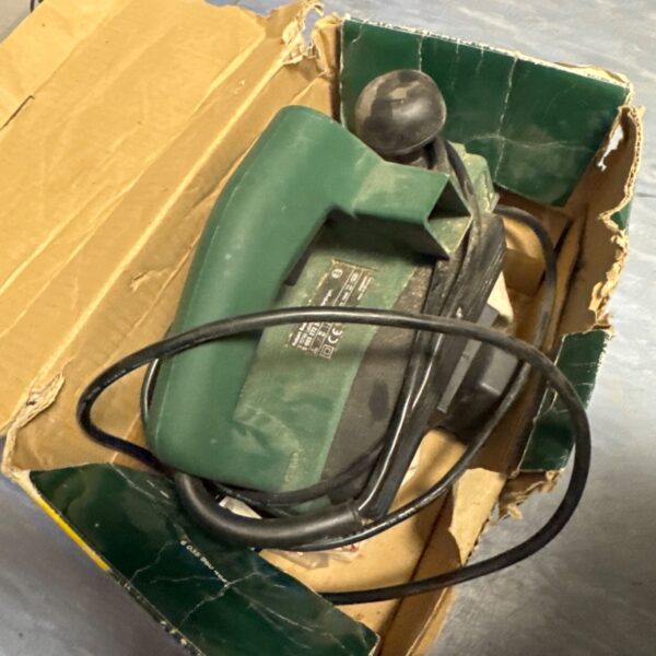 Vintage Bosch PHO 1 electric wood planer in used condition.