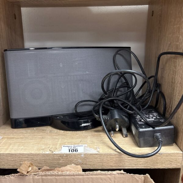Black Bose SoundDock Series II docking station with power cable.