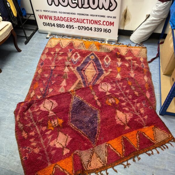 Vintage Boujaad rug with red and purple geometric pattern.