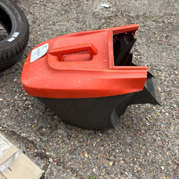 Red B&Q mower backbox, a used lawnmower part.