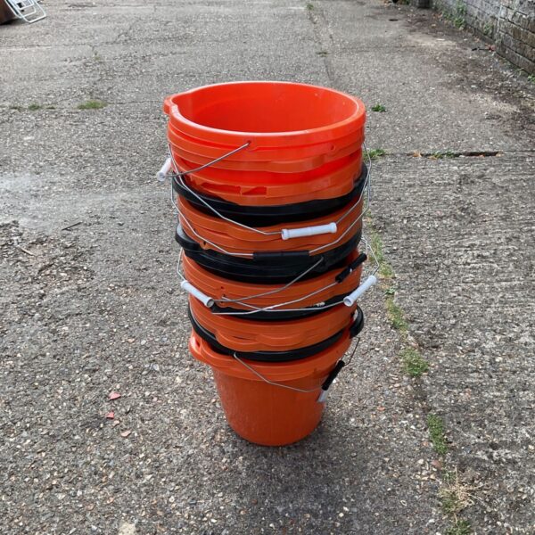 Orange plastic buckets from B&Q, a job lot for storage.