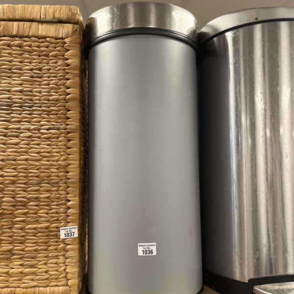 Stainless steel Brabantia pedal bin for kitchen waste disposal.