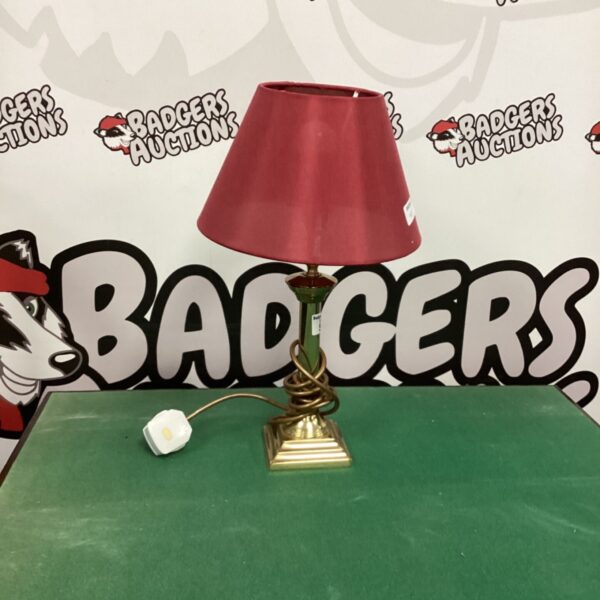 Vintage brass table lamp with a fabric shade.