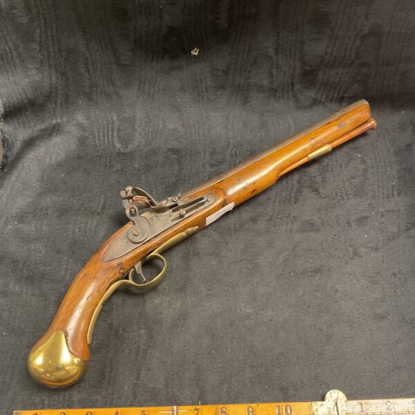 Antique British Tower flintlock pistol with brass fittings.