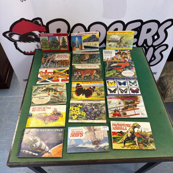 Group of vintage Brooke Bond picture card booklets, collectible tea cards.