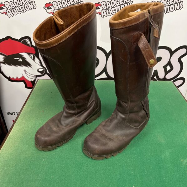 Brown leather boots with a vibrant coloured sole, size 10.