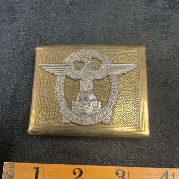 Vintage B.U.F. Mosley brass belt buckle with eagle emblem.