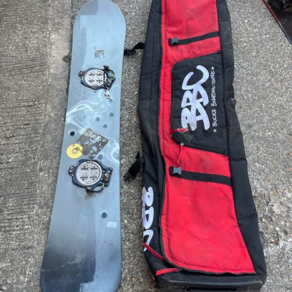 Used Burton snowboard with grey and black gradient and channel mounting system.