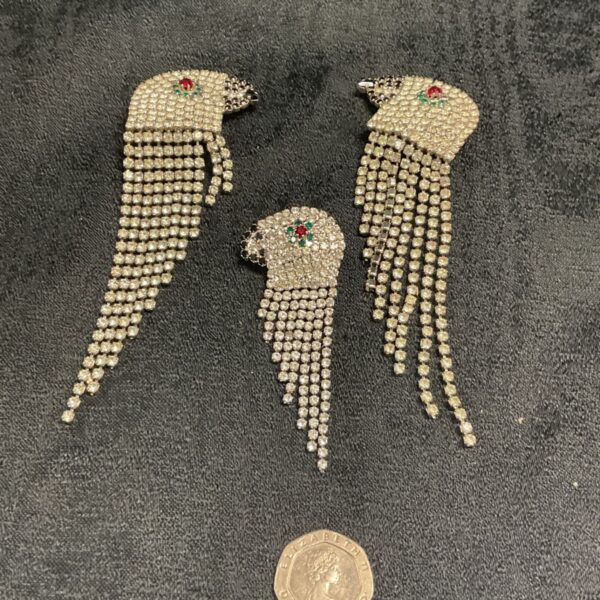 Vintage Butler and Wilson rhinestone parrot brooch and earrings set.
