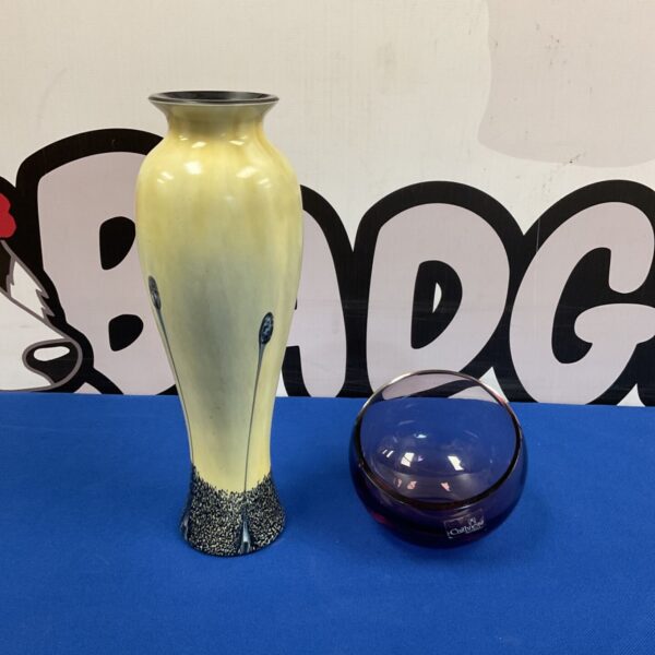 Stunning Caithness art glass vase with a flowing amber and yellow design.