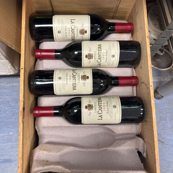 Ten bottles of 1993 Carinena La Cantera wine in a wooden case.