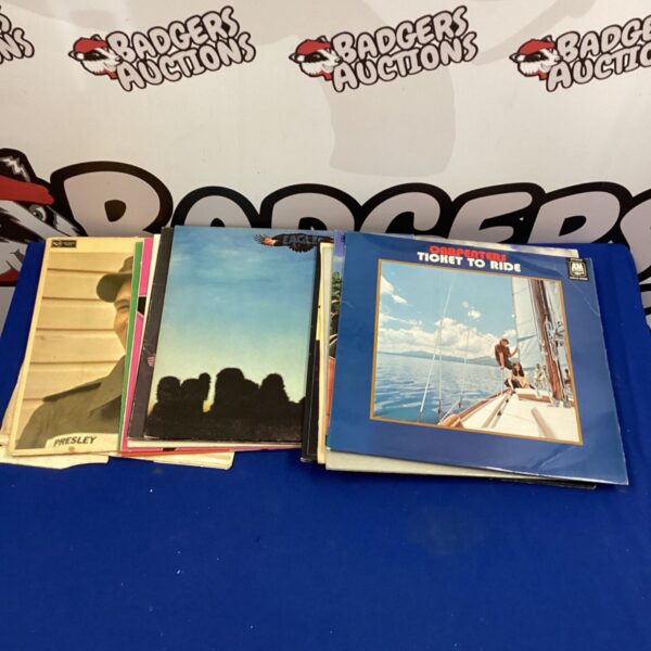 Vintage vinyl record collection featuring The Carpenters and The Eagles.