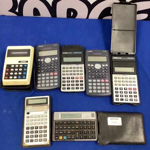 Vintage scientific calculators including Casio and HP models.