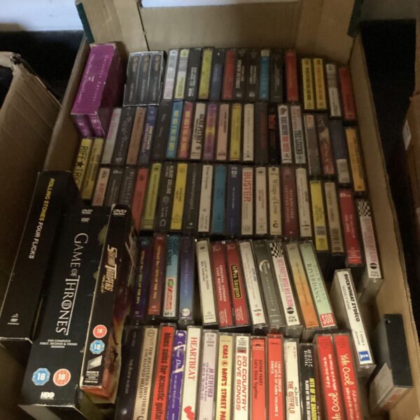 Large collection of vintage cassette tapes spanning multiple genres.