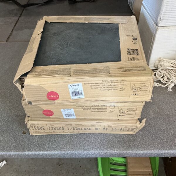 Stack of three ceramic floor tile packs, model 3360.