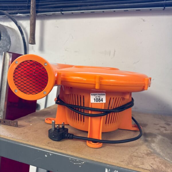Orange Chad Valley bouncy castle blower for inflatables.