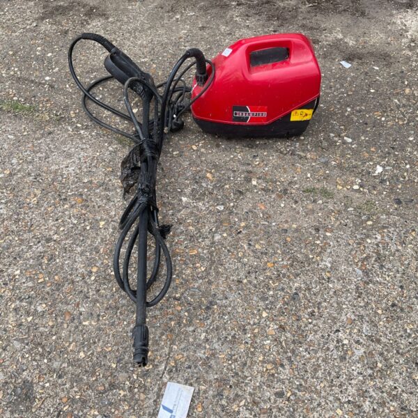 Red Champion compact pressure washer with hose and lance.