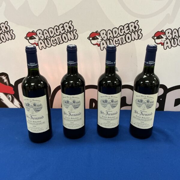Four bottles of Chateau St-Arnaud 2008 Burgundy wine.
