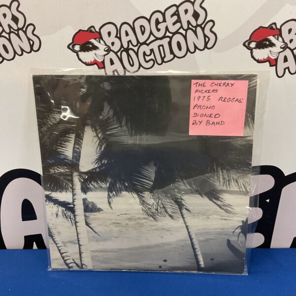 Vintage The Cherry Pickers reggae record with band signature.