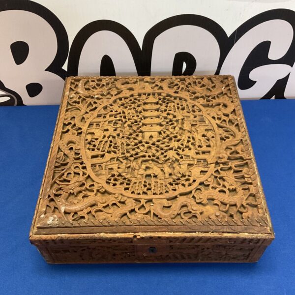 Intricately carved Chinese wooden dragon box, vintage collectible.