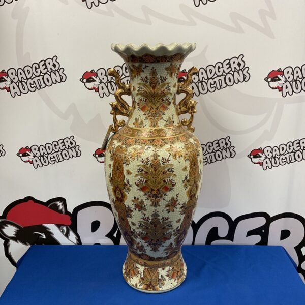 Large hand-painted Chinese vase with detailed floral designs.