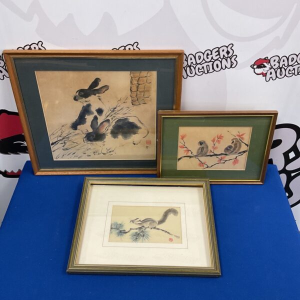 Framed Chinese watercolour painting of a squirrel.