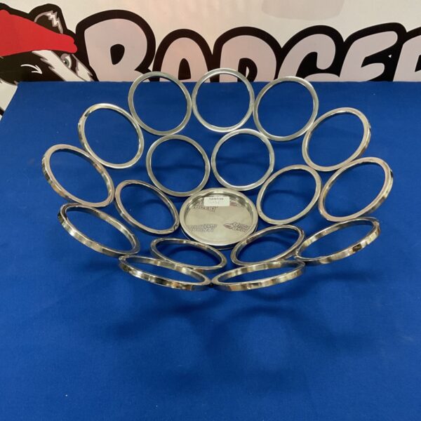 Modern chrome fruit bowl with a unique ring design.